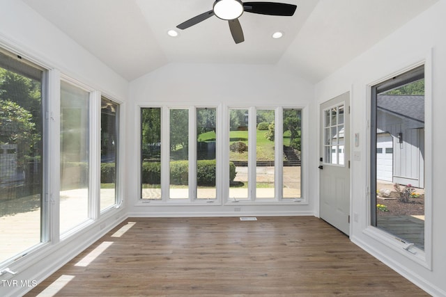 119 Orchard Meadows Ln, Roan Mountain, TN 37687 - unfurnished sunroom with healthy amount of natural light, vaulted ceiling, wood finished floors, and recessed lighting