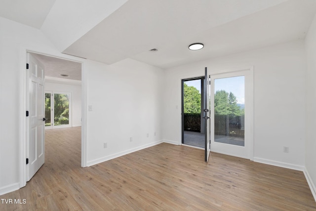 119 Orchard Meadows Ln, Roan Mountain, TN 37687 - empty room with light wood finished floors and plenty of natural light
