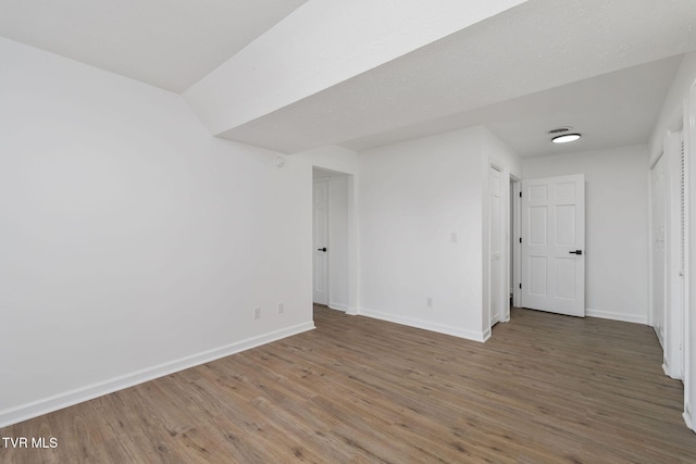 119 Orchard Meadows Ln, Roan Mountain, TN 37687 - unfurnished room featuring wood finished floors and baseboards