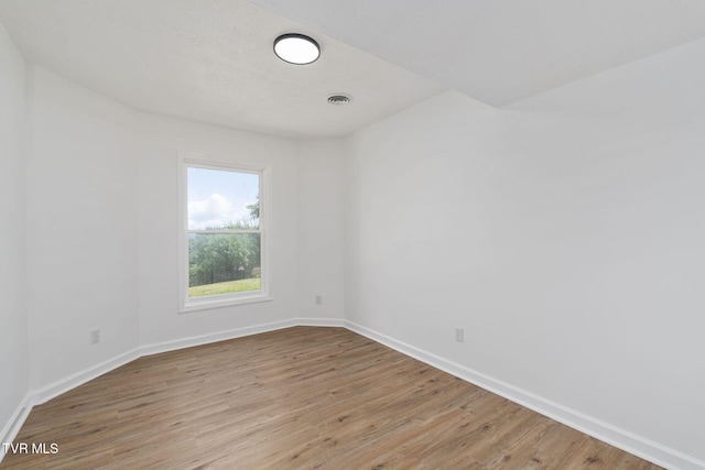 119 Orchard Meadows Ln, Roan Mountain, TN 37687 - spare room with light wood-style floors and baseboards