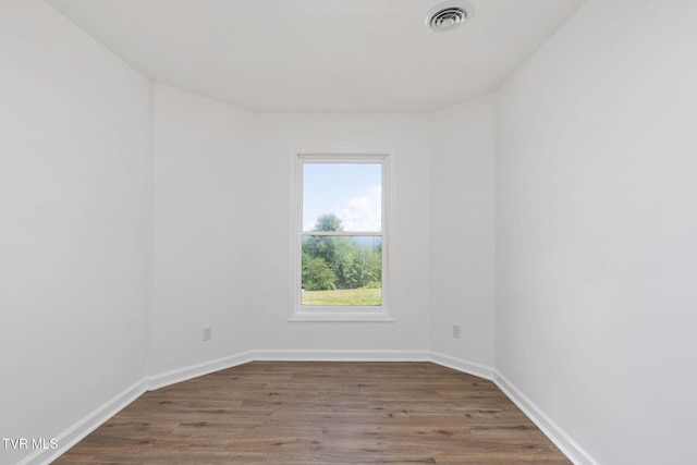 119 Orchard Meadows Ln, Roan Mountain, TN 37687 - unfurnished room featuring wood finished floors and baseboards