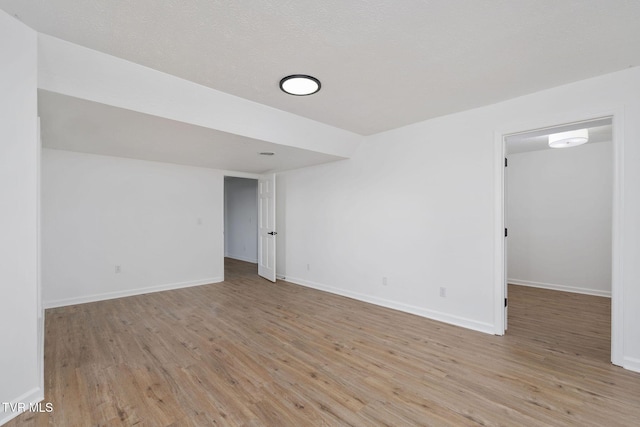119 Orchard Meadows Ln, Roan Mountain, TN 37687 - spare room featuring light wood-type flooring and baseboards