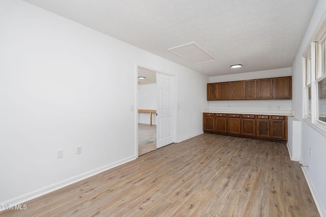 119 Orchard Meadows Ln, Roan Mountain, TN 37687 - kitchen with light wood-style floors and light countertops