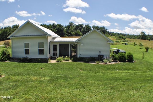 286 Sliger Rd, Jonesborough, TN 37659 - view of front of home featuring a sunroom, a front lawn, and a metal roof