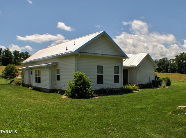 286 Sliger Rd, Jonesborough, TN 37659 - view of property exterior featuring a lawn and a metal roof