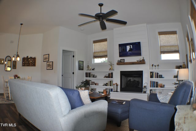 286 Sliger Rd, Jonesborough, TN 37659 - living room featuring a chandelier, a ceiling fan, dark wood-style flooring, and a large fireplace