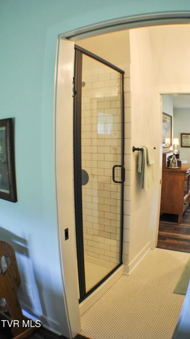 286 Sliger Rd, Jonesborough, TN 37659 - bathroom with a shower stall and wood finished floors
