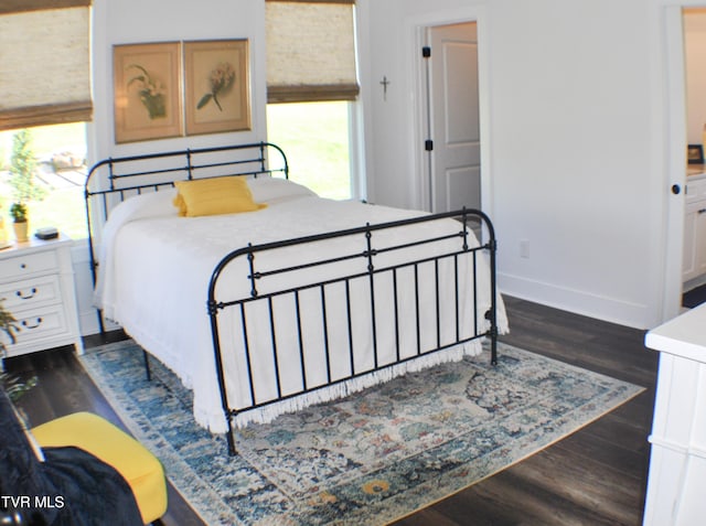 286 Sliger Rd, Jonesborough, TN 37659 - bedroom with dark wood-type flooring and baseboards