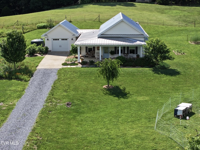 286 Sliger Rd, Jonesborough, TN 37659 - view of front of home featuring driveway, a porch, a metal roof, and a garage