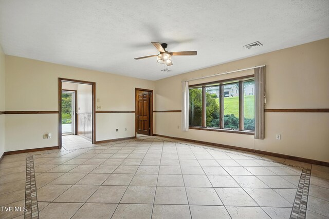 134 Richmond Hts, Jonesville, VA 24263 - empty room featuring ceiling fan, light tile patterned floors, and inlaid floor details
