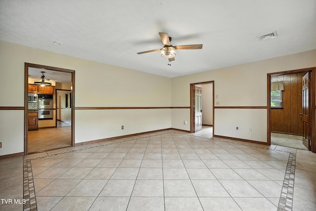 134 Richmond Hts, Jonesville, VA 24263 - spare room with ceiling fan, light tile patterned flooring, and inlaid floor details