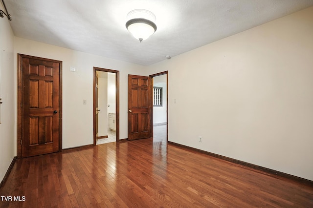 134 Richmond Hts, Jonesville, VA 24263 - unfurnished bedroom with hardwood / wood-style floors and baseboards