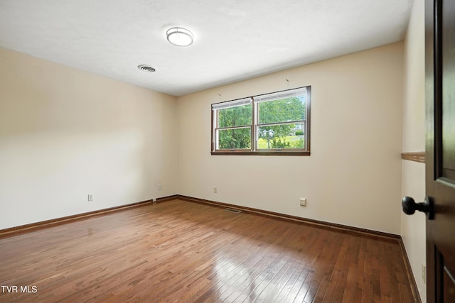 134 Richmond Hts, Jonesville, VA 24263 - spare room with hardwood / wood-style floors and baseboards