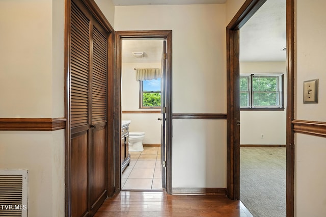 134 Richmond Hts, Jonesville, VA 24263 - hall with baseboards and heating unit