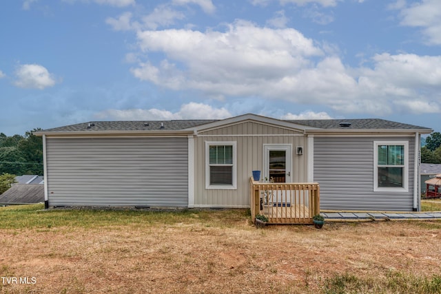 2311 Serenity Ct, Kingsport, TN 37665 - rear view of property featuring a yard, board and batten siding, and a shingled roof