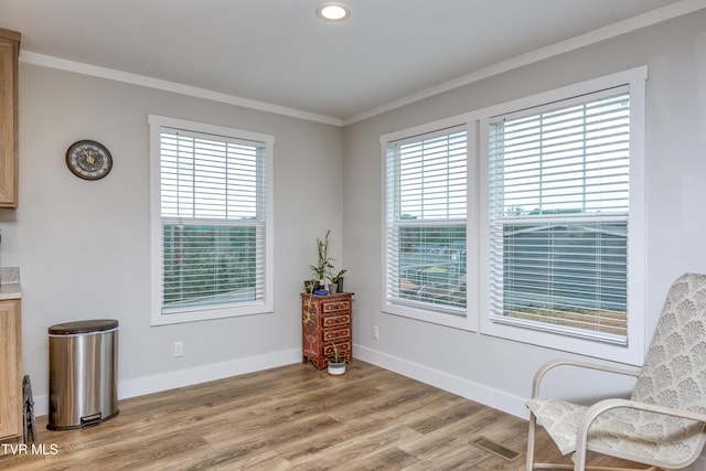 2311 Serenity Ct, Kingsport, TN 37665 - living area with ornamental molding, light wood finished floors, and recessed lighting