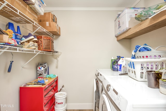 2311 Serenity Ct, Kingsport, TN 37665 - washroom featuring washing machine and dryer and wood finished floors