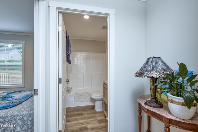 2311 Serenity Ct, Kingsport, TN 37665 - full bathroom featuring wood finished floors, ornamental molding, washtub / shower combination, and recessed lighting