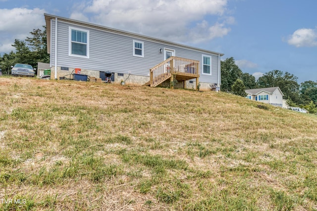 2311 Serenity Ct, Kingsport, TN 37665 - rear view of property featuring crawl space and a lawn