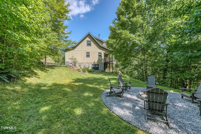 410 Eagle Ridge Rd, Roan Mountain, TN 37687 - view of grassy yard featuring an outdoor fire pit