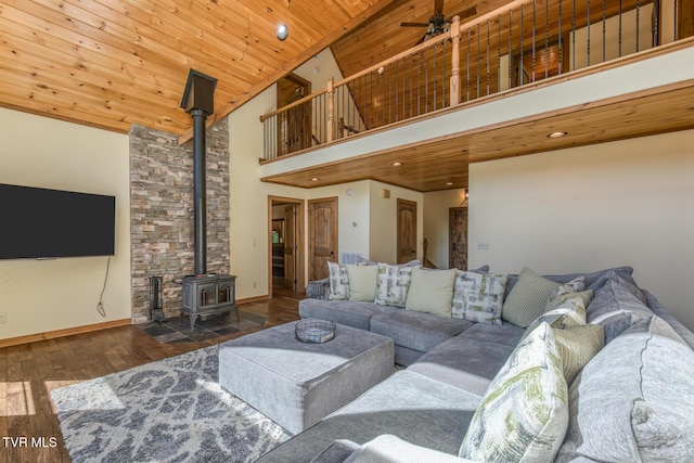 410 Eagle Ridge Rd, Roan Mountain, TN 37687 - living room featuring a wood stove, high vaulted ceiling, wood finished floors, a ceiling fan, and recessed lighting