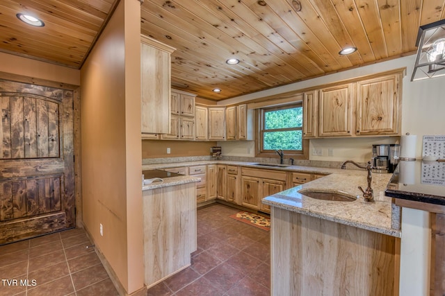 410 Eagle Ridge Rd, Roan Mountain, TN 37687 - kitchen featuring light brown cabinets, recessed lighting, a peninsula, light stone counters, and wood ceiling