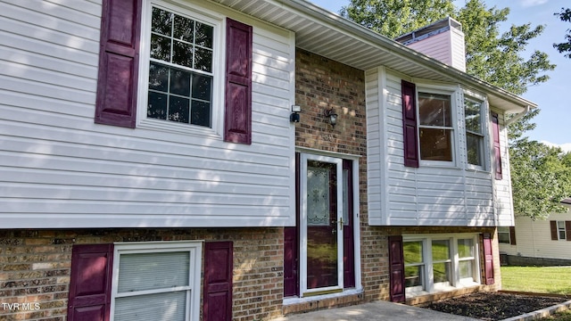 130 Kiser Cir, Jonesborough, TN 37659 - view of front facade with brick siding and a chimney