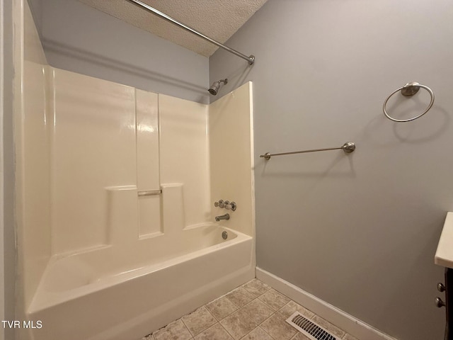130 Kiser Cir, Jonesborough, TN 37659 - full bath featuring a textured ceiling, bathing tub / shower combination, and tile patterned flooring