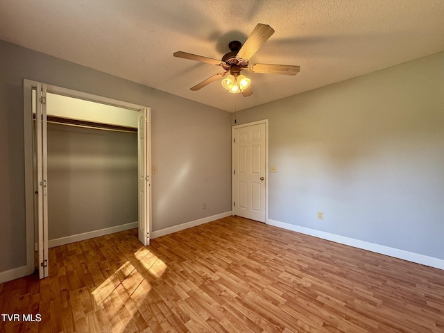 130 Kiser Cir, Jonesborough, TN 37659 - unfurnished bedroom with light wood-type flooring, a closet, and a ceiling fan