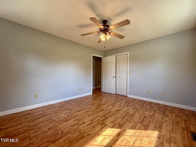 130 Kiser Cir, Jonesborough, TN 37659 - unfurnished bedroom with light wood finished floors, a closet, and ceiling fan