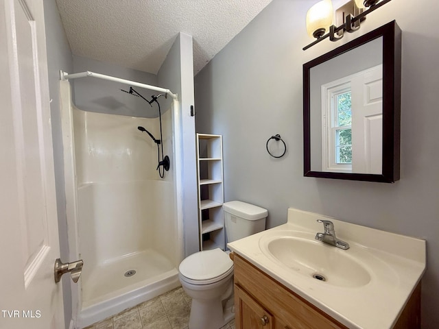 130 Kiser Cir, Jonesborough, TN 37659 - bathroom with vanity, a shower, tile patterned flooring, and a textured ceiling