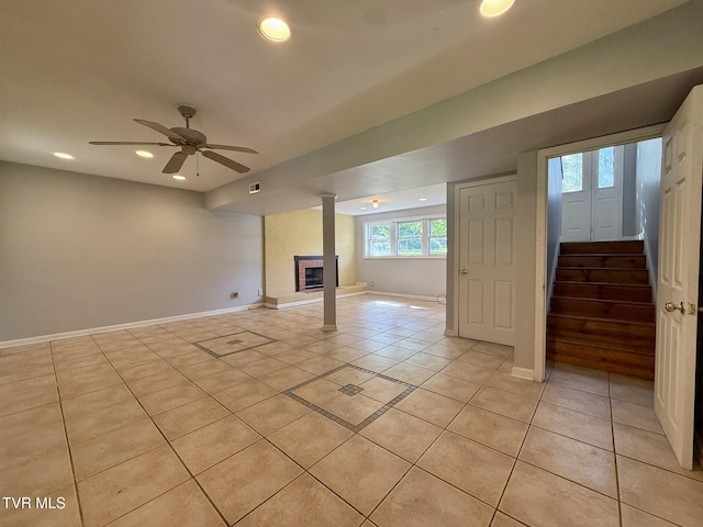 130 Kiser Cir, Jonesborough, TN 37659 - below grade area with light tile patterned floors, recessed lighting, stairs, a fireplace with raised hearth, and ceiling fan
