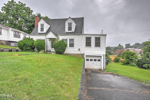 1230 Carolina Ave, Bristol, TN 37620 - new england style home with a garage, driveway, a front lawn, a chimney, and roof with shingles