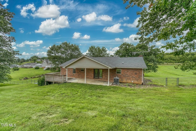15060 Peaceful Valley Rd, Abingdon, VA 24210 - back of property with a patio, brick siding, and roof with shingles