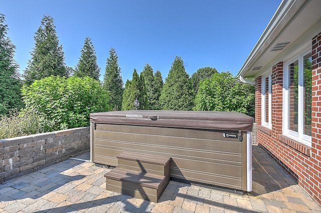 6054 Old Jonesboro Rd, Bristol, TN 37620 - view of patio featuring a hot tub