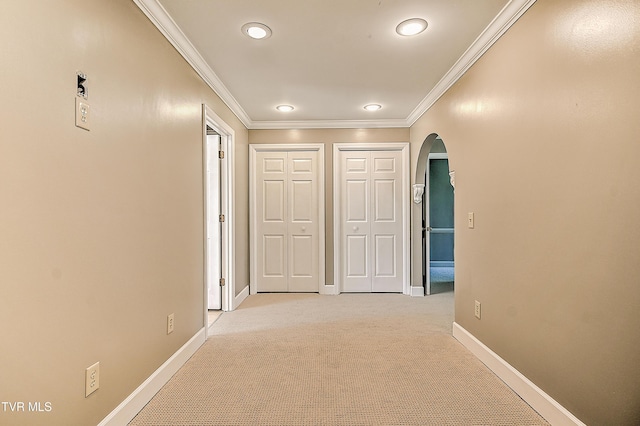 6054 Old Jonesboro Rd, Bristol, TN 37620 - hall featuring arched walkways, crown molding, light carpet, and recessed lighting