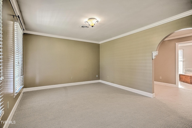 6054 Old Jonesboro Rd, Bristol, TN 37620 - carpeted spare room featuring ornamental molding and arched walkways