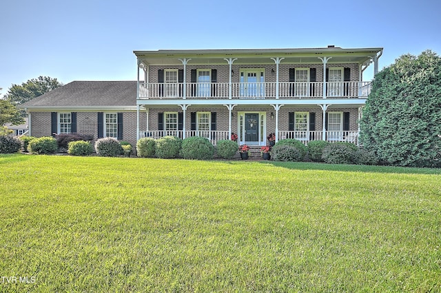6054 Old Jonesboro Rd, Bristol, TN 37620 - view of front of house featuring brick siding, a porch, and a front lawn