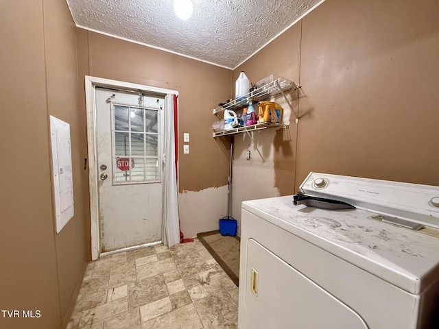943 Newman Hollow Rd, Bean Station, TN 37708 - laundry area with washer / clothes dryer, a textured ceiling, and stone finish floors