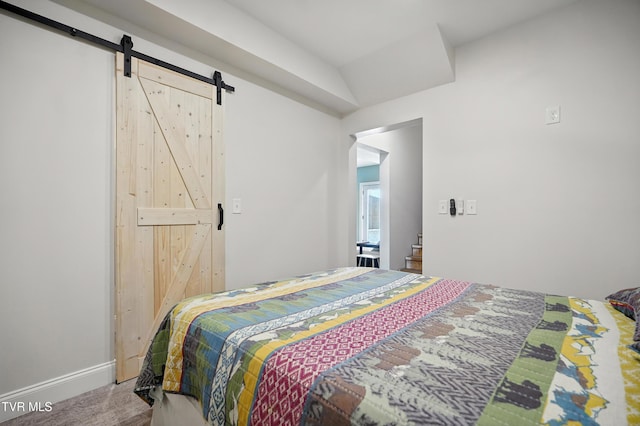162 Bob Ford Rd, Jonesborough, TN 37659 - bedroom featuring a barn door and wood finished floors