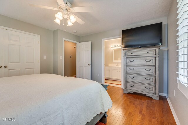 19275 Wyndale Rd, Abingdon, VA 24210 - bedroom featuring light wood-style floors, ensuite bath, a closet, and a ceiling fan