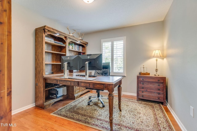 19275 Wyndale Rd, Abingdon, VA 24210 - office area featuring wood finished floors and a textured ceiling