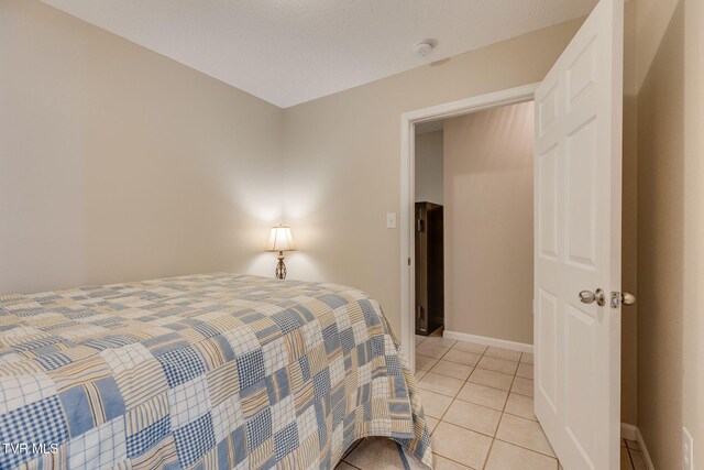 19275 Wyndale Rd, Abingdon, VA 24210 - bedroom with light tile patterned floors and baseboards