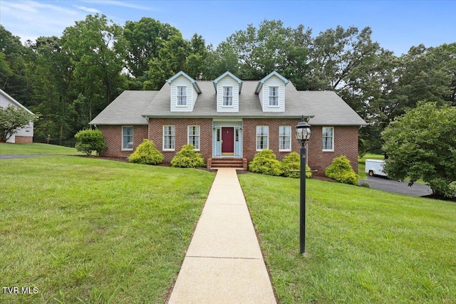 377 Overlook Dr, Blountville, TN 37617 - new england style home with brick siding and a front yard