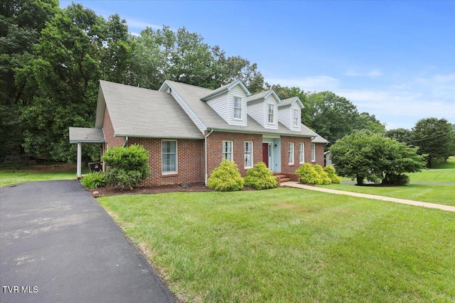 377 Overlook Dr, Blountville, TN 37617 - cape cod home featuring brick siding, a front lawn, driveway, and a shingled roof