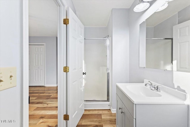 377 Overlook Dr, Blountville, TN 37617 - full bath with wood finished floors, a stall shower, and vanity