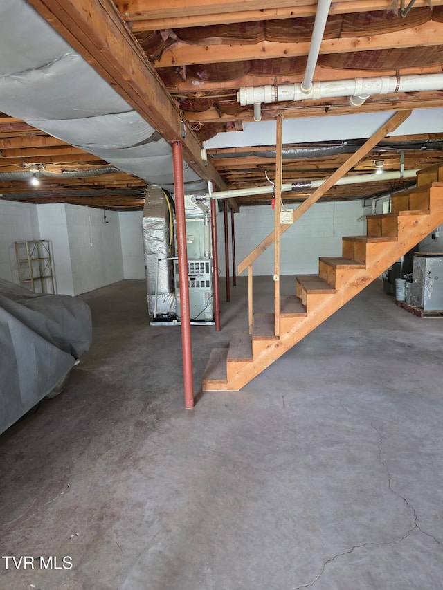 377 Overlook Dr, Blountville, TN 37617 - unfinished basement with stairs and heating unit