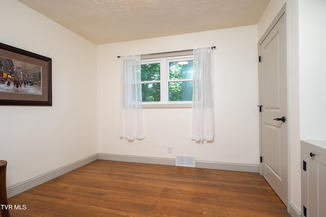 101 Ridgewood Dr, Bristol, TN 37620 - unfurnished room with wood finished floors and a textured ceiling