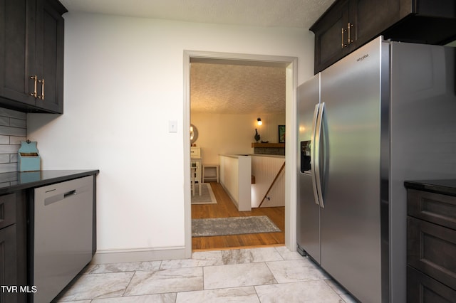 101 Ridgewood Dr, Bristol, TN 37620 - kitchen with stainless steel appliances and a textured ceiling