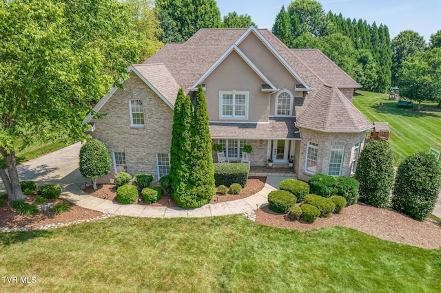 3 Chestnut Ridge Ct, Jonesborough, TN 37659 - traditional-style home with a front lawn, stucco siding, stone siding, and a shingled roof